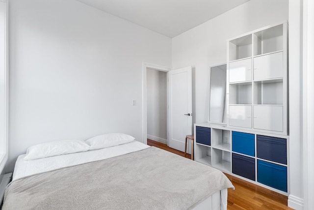 bedroom featuring hardwood / wood-style flooring