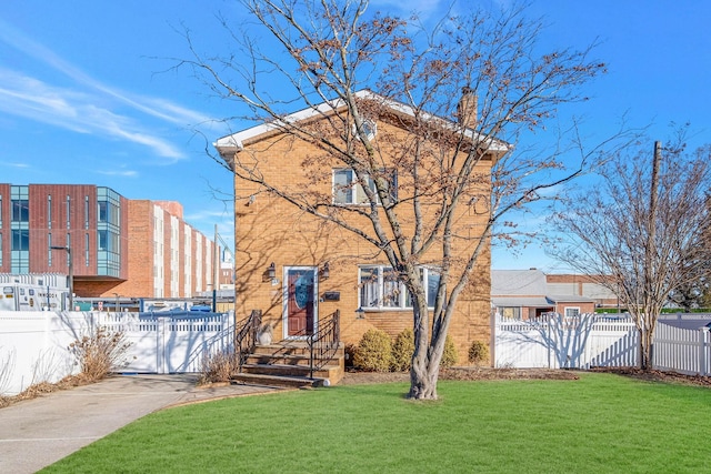 view of front of property with a front lawn