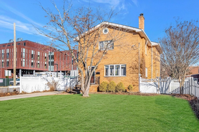 exterior space featuring a front lawn