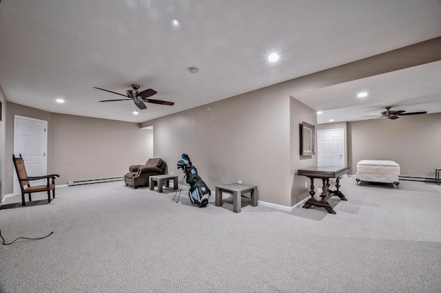 interior space featuring a baseboard heating unit, light carpet, and ceiling fan