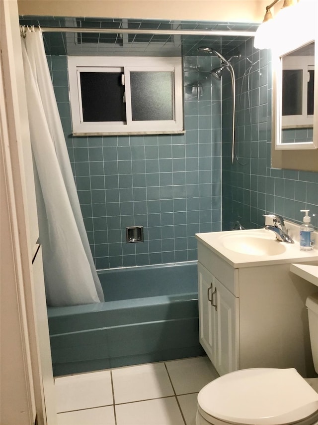 full bathroom with shower / tub combo, toilet, tile patterned floors, backsplash, and vanity