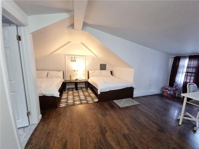 bedroom with vaulted ceiling with beams, dark hardwood / wood-style floors, and a baseboard radiator