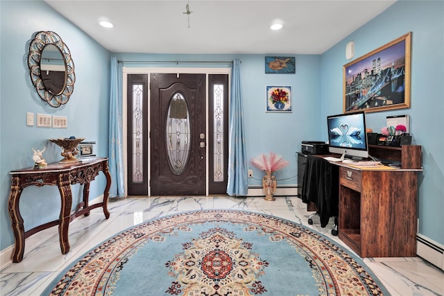 foyer entrance featuring baseboard heating