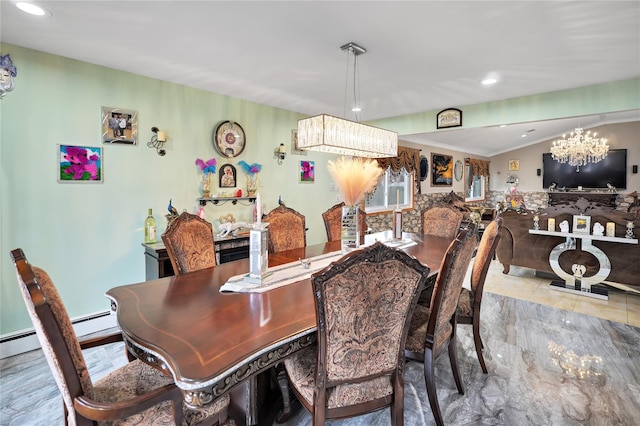 tiled dining room with an inviting chandelier