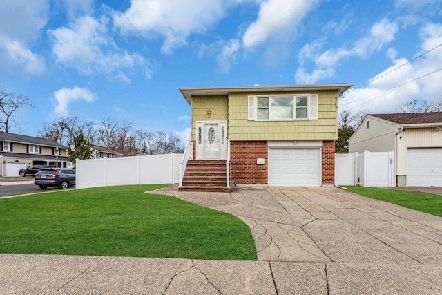 view of front facade featuring a front yard and a garage