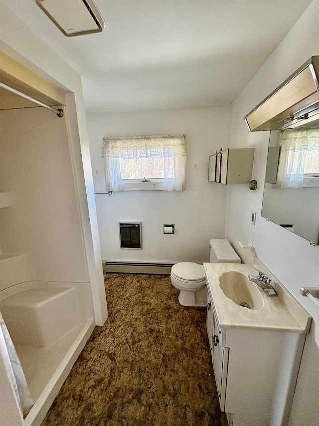 23 Riverside Dr, Roscoe, NY 12776 - bathroom with a baseboard heating unit, vanity, toilet, and a shower