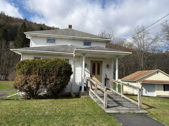 23 Riverside Dr, Roscoe, NY 12776 - view of front of home featuring a shingled roof and a front yard