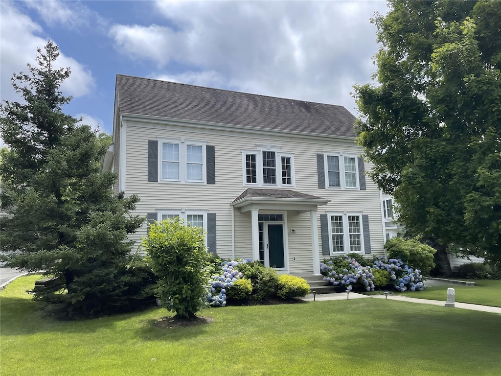 colonial house with a front yard