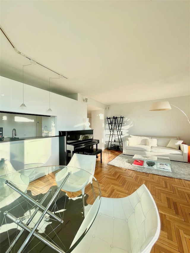 living room featuring parquet floors