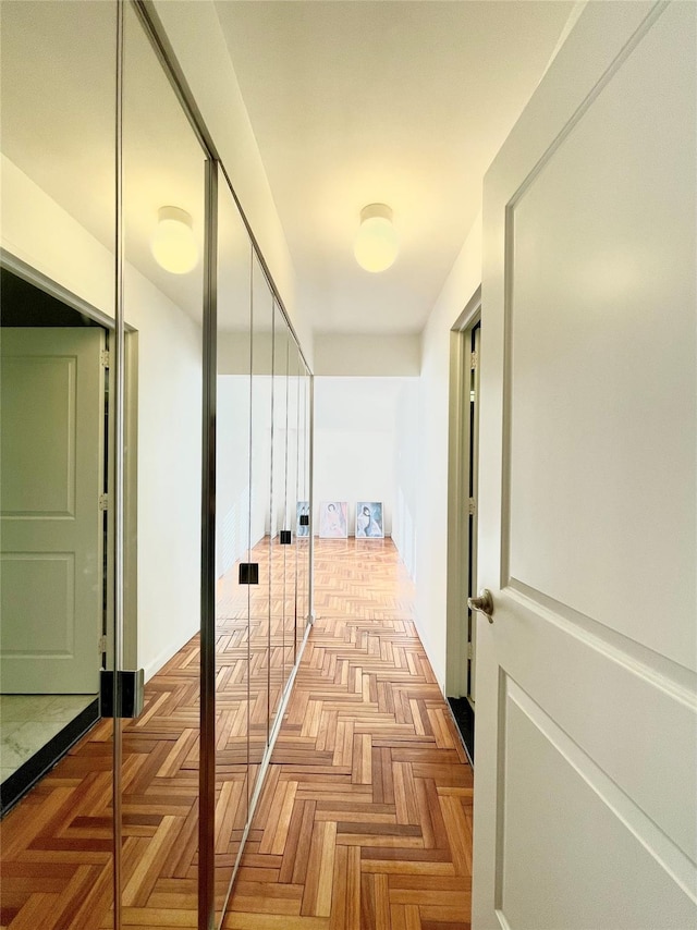 corridor with parquet flooring