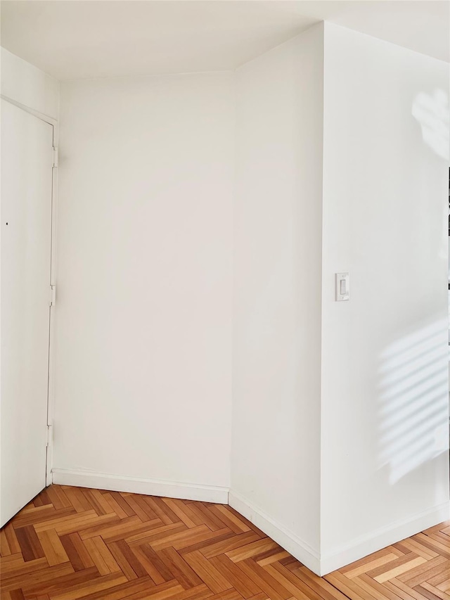 spare room with light parquet flooring