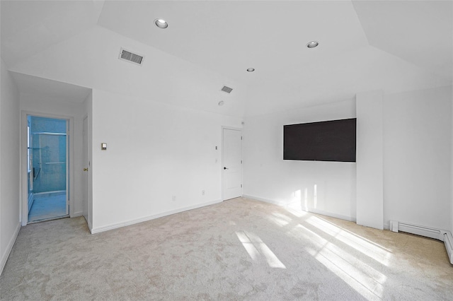 empty room featuring carpet floors, recessed lighting, baseboards, and lofted ceiling