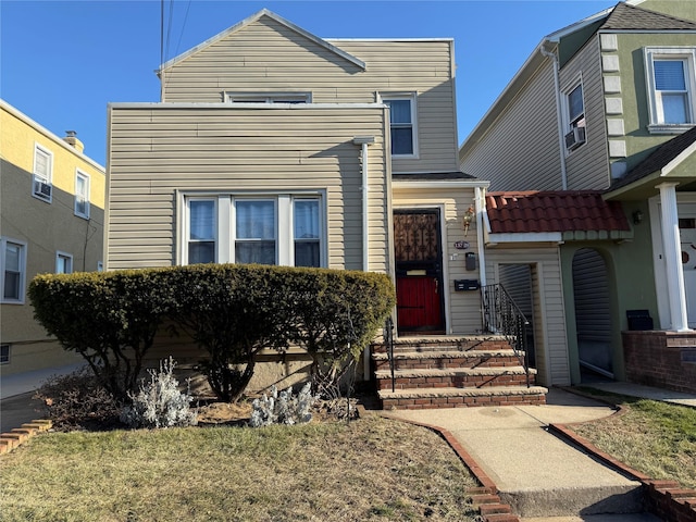 view of front of home with a front yard