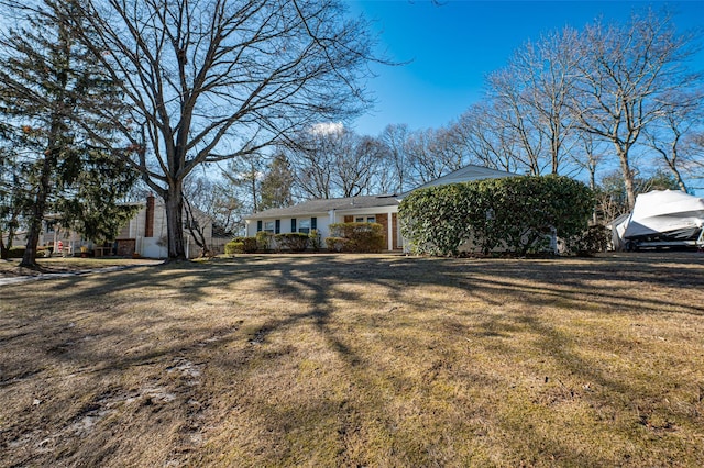 exterior space with a front yard