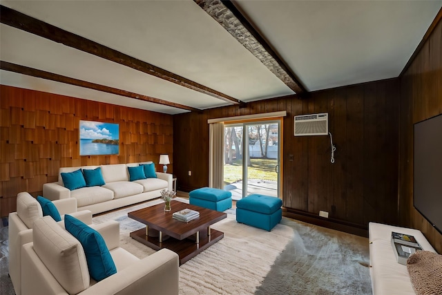 living room featuring beamed ceiling, wooden walls, and an AC wall unit