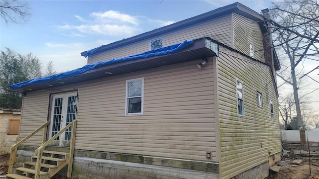 view of home's exterior featuring french doors