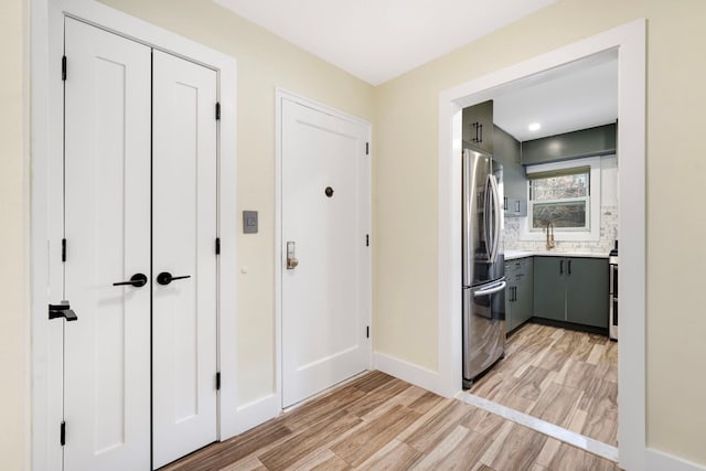 hall featuring light hardwood / wood-style floors