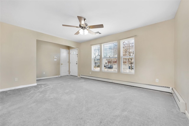 carpeted empty room featuring a baseboard radiator, baseboards, visible vents, and ceiling fan