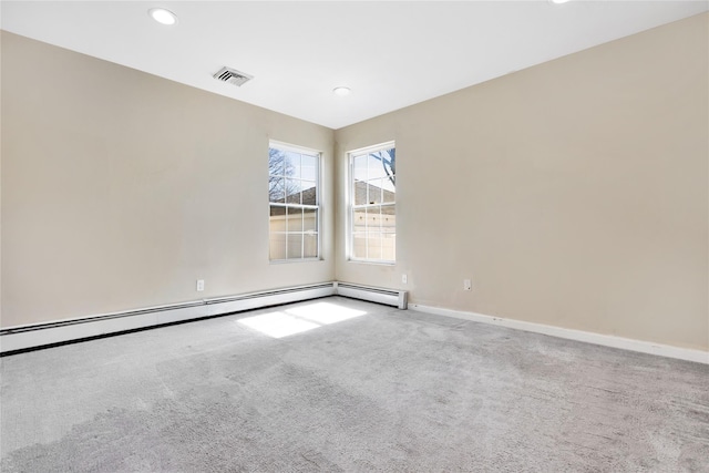 empty room featuring recessed lighting, carpet flooring, baseboards, and visible vents