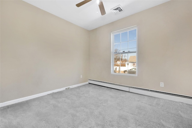 empty room featuring visible vents, a ceiling fan, carpet, a baseboard radiator, and baseboards