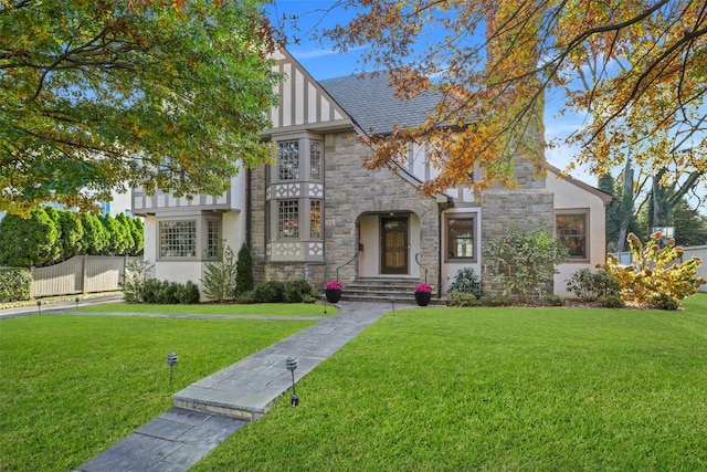 tudor house with a front yard