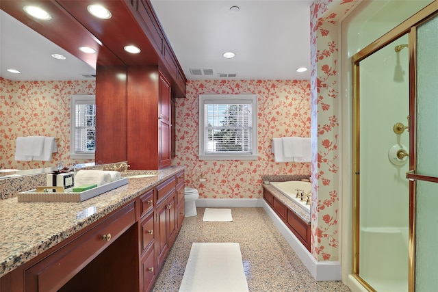 full bathroom with toilet, shower with separate bathtub, and vanity