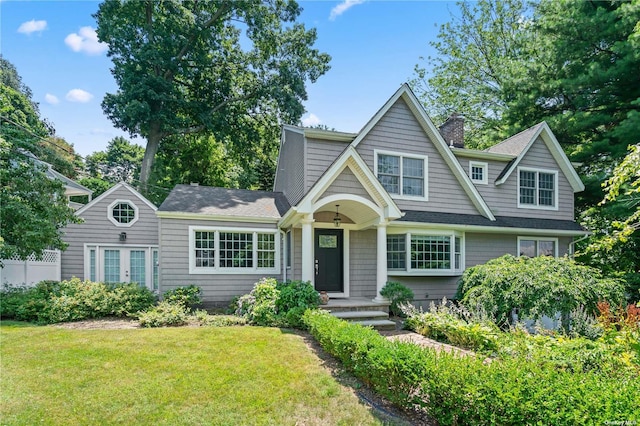 view of front of property with a front lawn