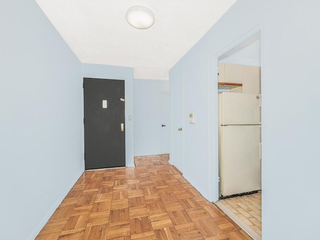 hallway featuring light parquet floors