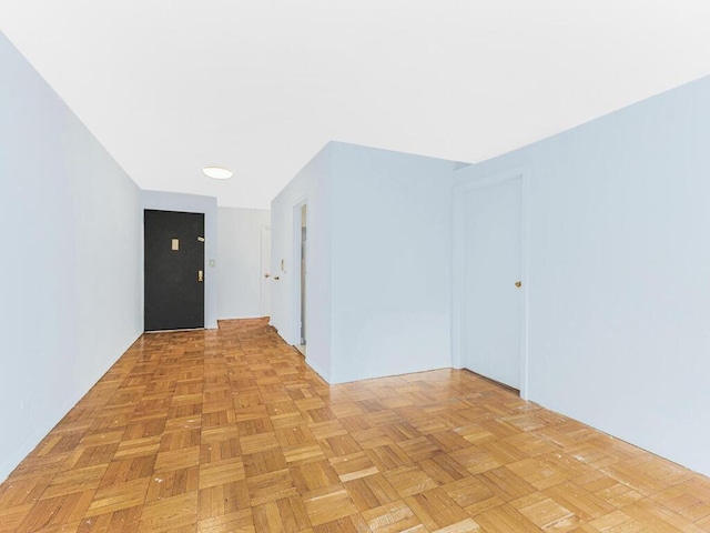 interior space with light parquet floors