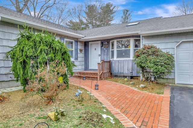 property entrance with a garage