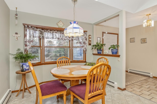 tiled dining room with a notable chandelier and a baseboard radiator