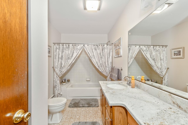 full bathroom with toilet, vanity, and shower / tub combo