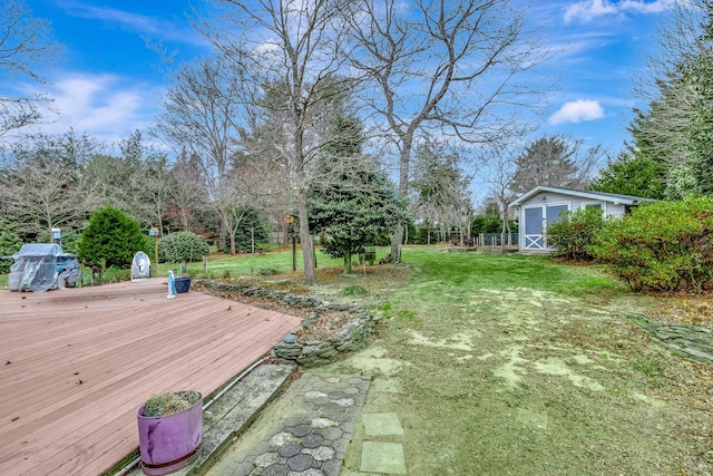 view of yard with a wooden deck