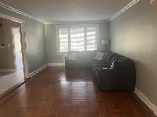 living room featuring dark parquet flooring and ornamental molding