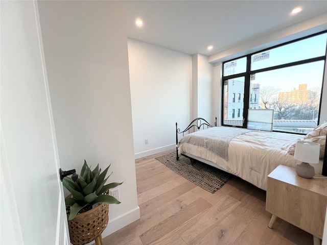 bedroom featuring light hardwood / wood-style flooring