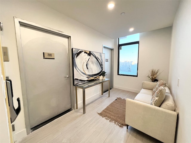 living area featuring light wood-type flooring