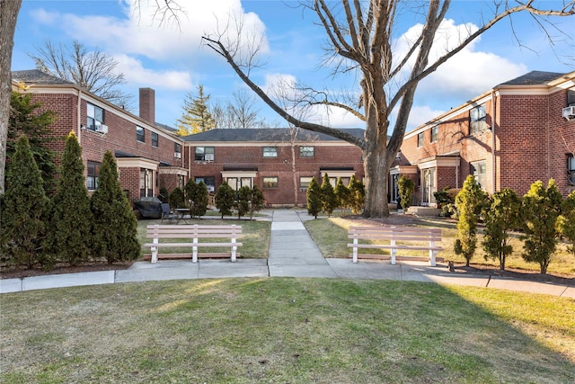 view of community with a lawn