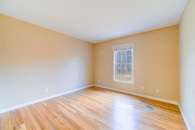 unfurnished room featuring light hardwood / wood-style floors