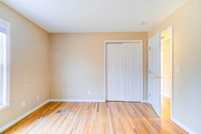 unfurnished room featuring light hardwood / wood-style flooring