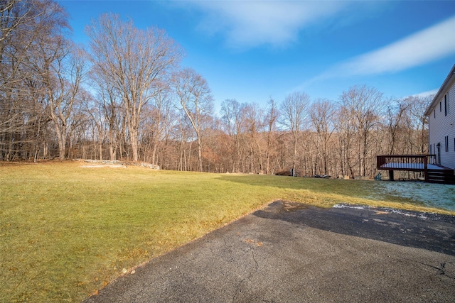 view of yard featuring a deck