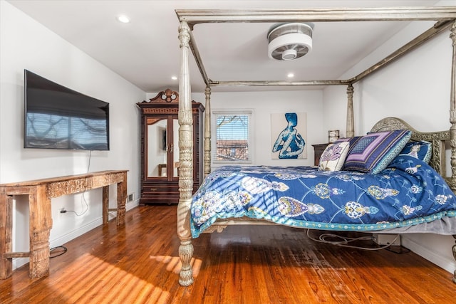 bedroom featuring hardwood / wood-style flooring