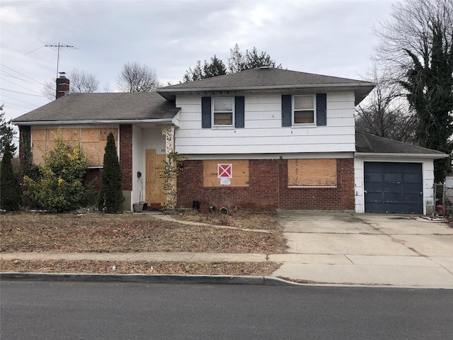 tri-level home featuring a garage