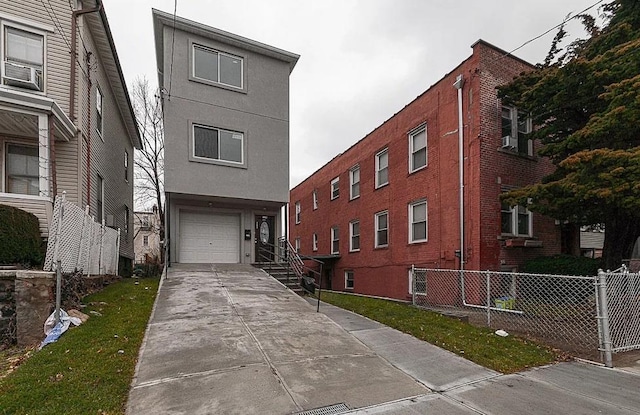 view of property featuring a garage