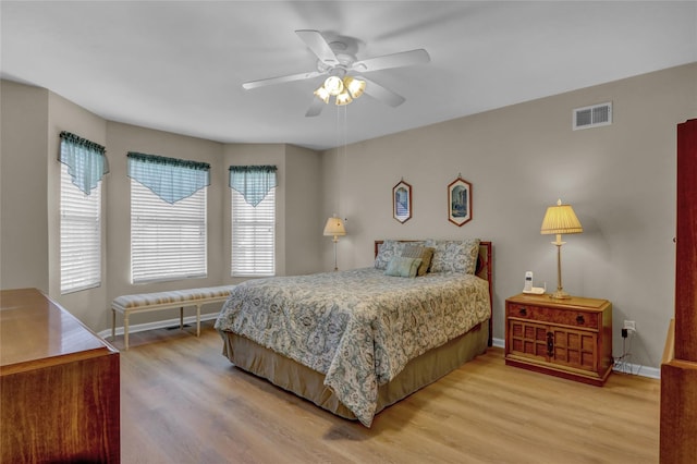 bedroom featuring ceiling fan and hardwood / wood-style floors