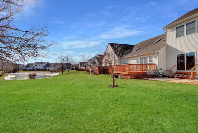 view of yard featuring a wooden deck