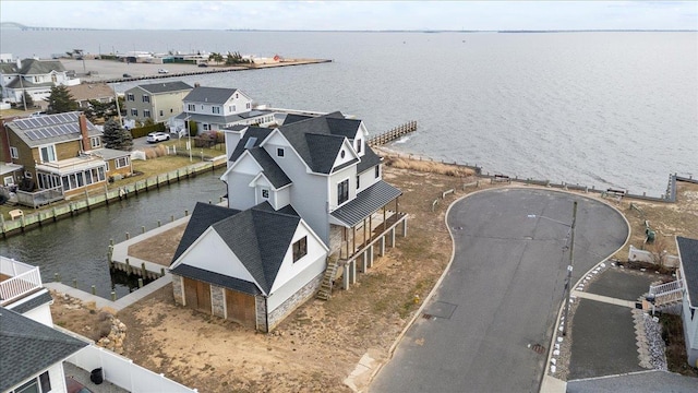 drone / aerial view with a water view