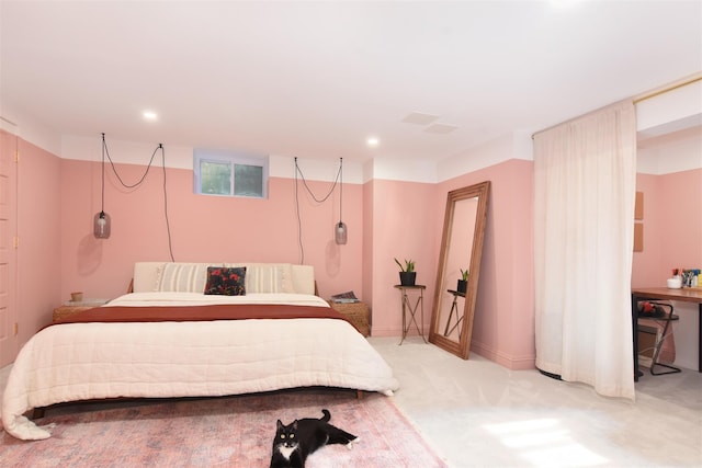 bedroom featuring light colored carpet