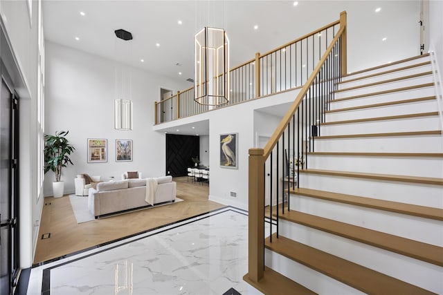 living room featuring a high ceiling