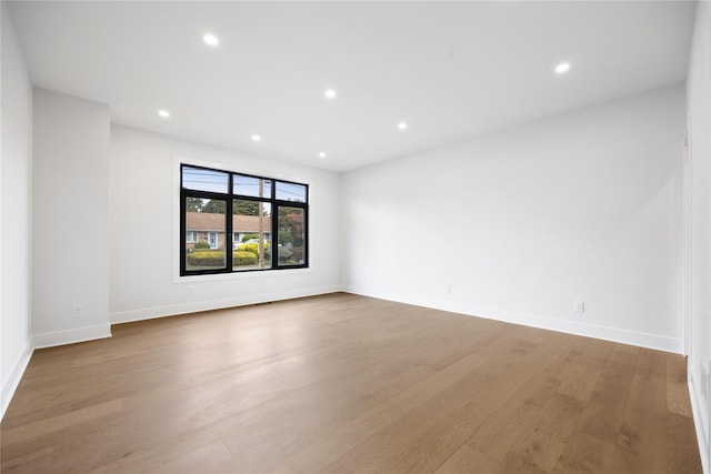 empty room with light wood-type flooring