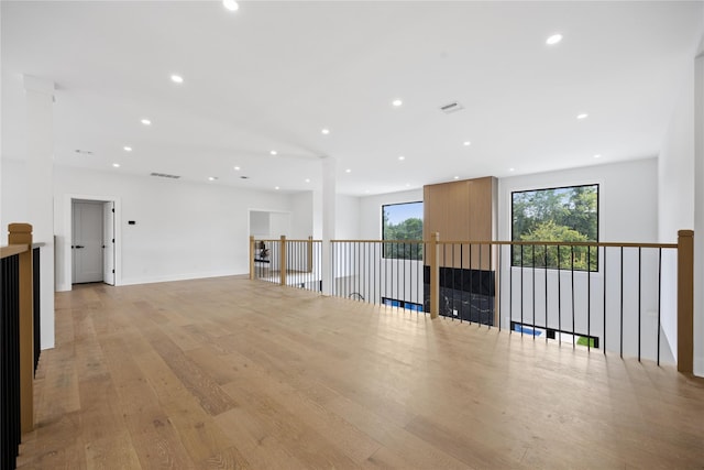 spare room featuring light wood-type flooring